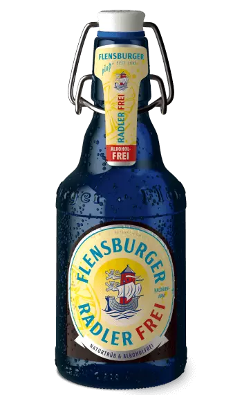 Packshot mit Glas Flensburger Radler alkoholfrei