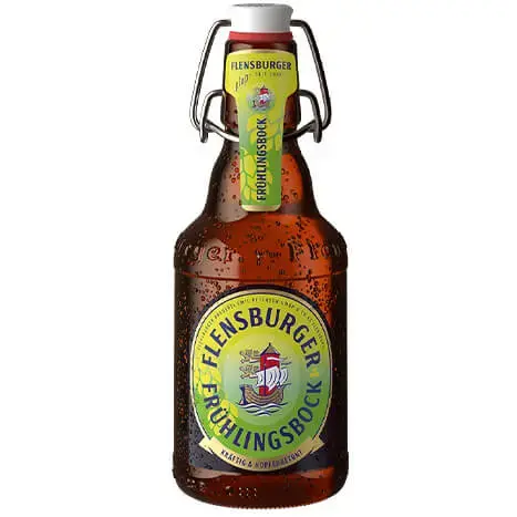 Flensburger Pilsener Bierflasche mit Bügelverschluss auf Holztisch.