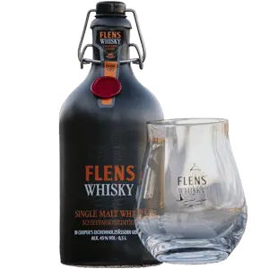 Single Malt Whisky aus der hochwertigen Maische des Flensburger Frühlingsbocks, rechts daneben ein Whiskyglas.