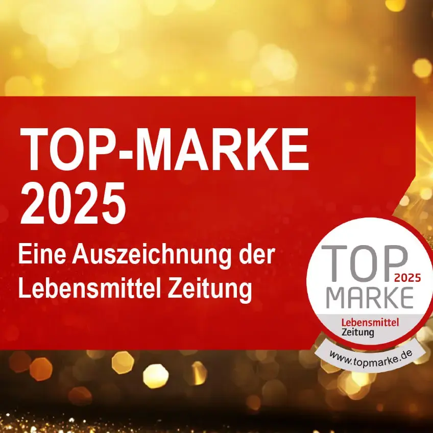 Text "Top-Marke 2025" auf rotem Hintergrund und goldener Glitzer im Hintergrund.